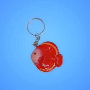 Handcrafted wooden fish-shaped souvenir keyring.