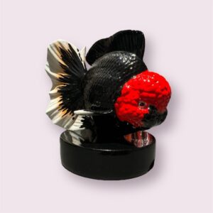 Hand-painted ceramic fish souvenir.
